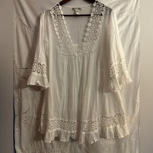 Cute Options 100% white cotton top. Romantic, whimsical. Never worn.
